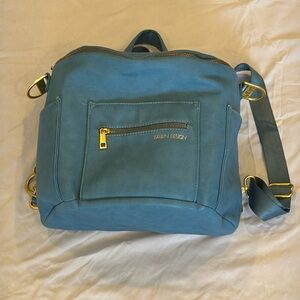 Medium blue Fawn Design diaper bag. Discontinued color.